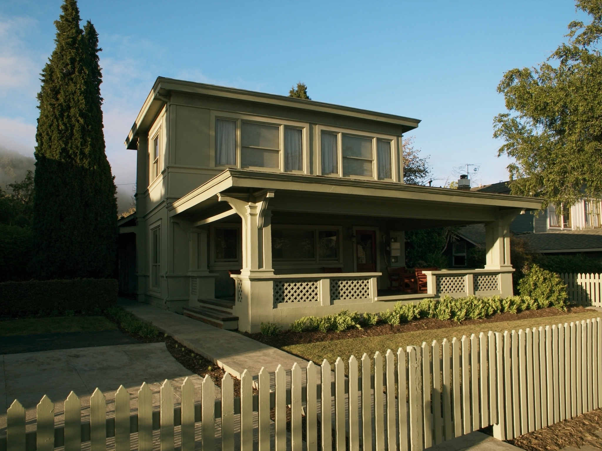 Illustration of a detached rental home with a planted front garden